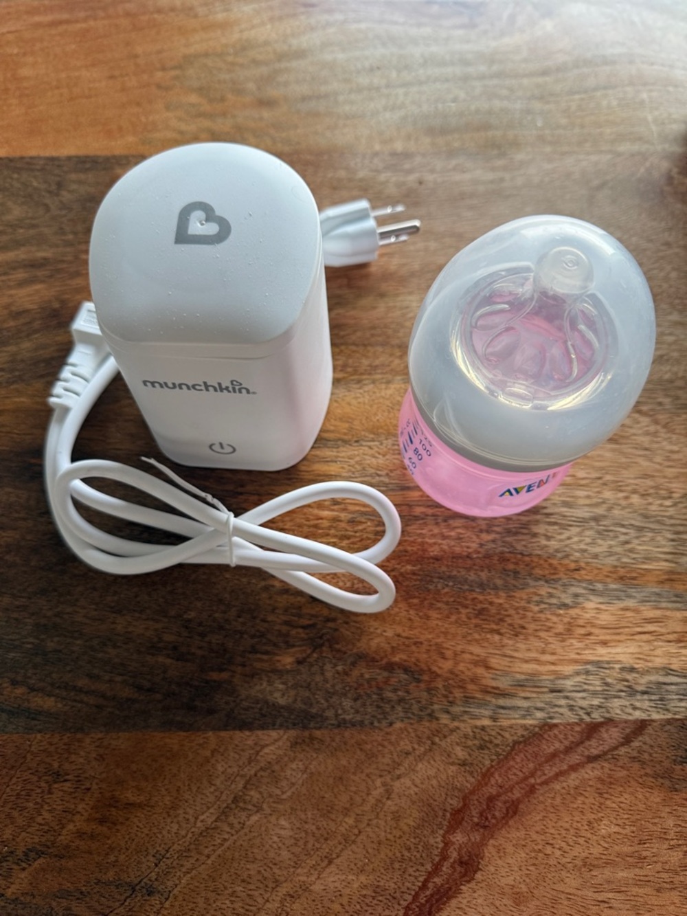 Munchkin White Bottle Warmer with Pink Baby Bottle